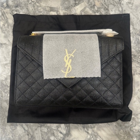 Yves Saint Laurent Black Quilted Clutch with Gold Logo - Picture 2 of 6